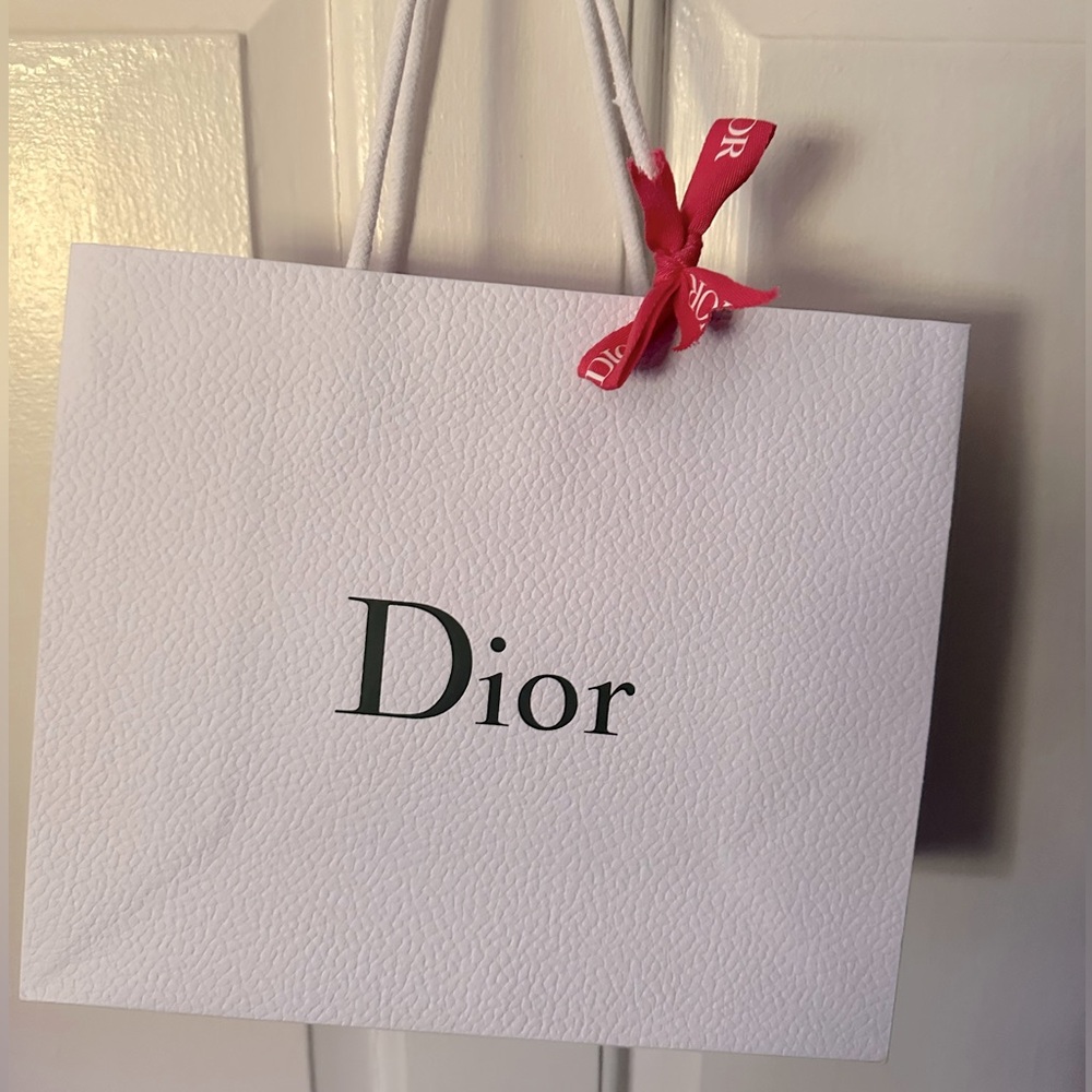 Authentic Dior textured paper gift bag with ribbon.